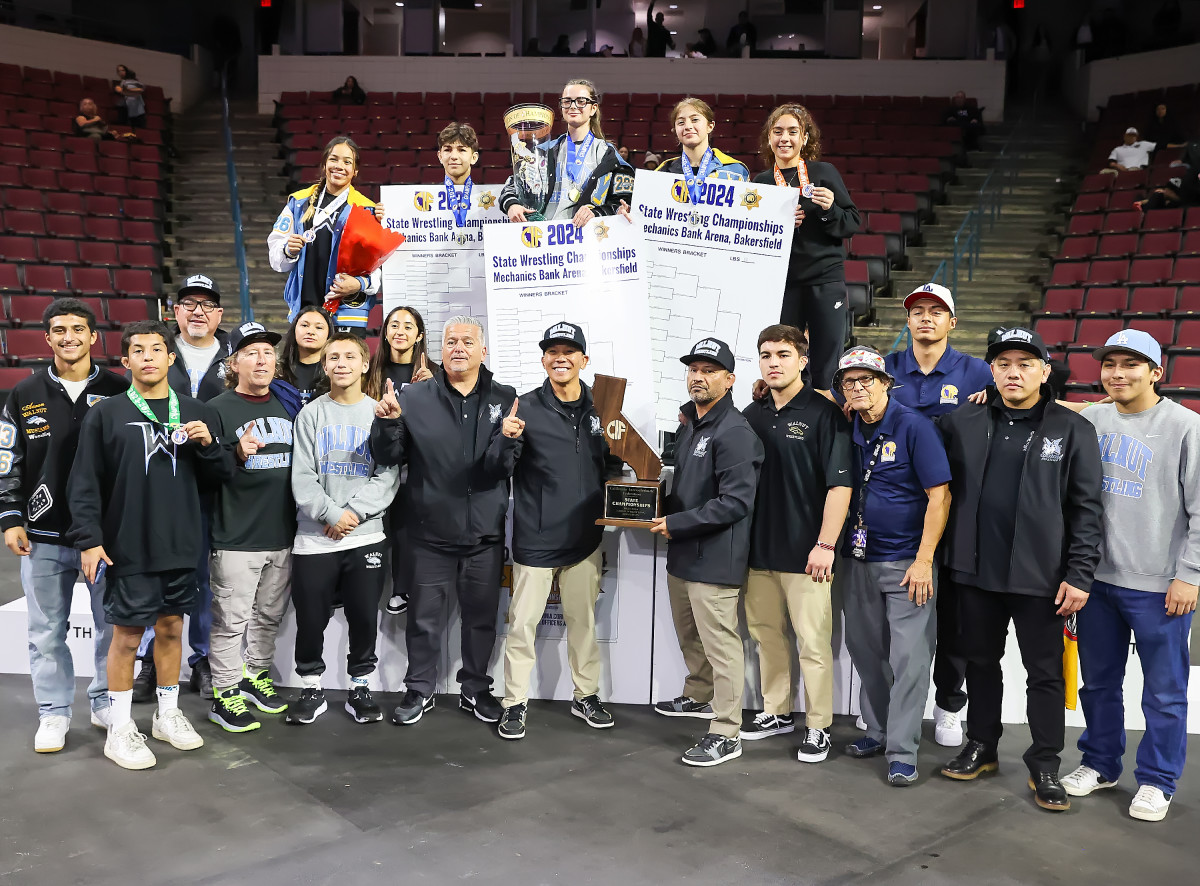 The Walnut team posing while celebrating the program's first state title